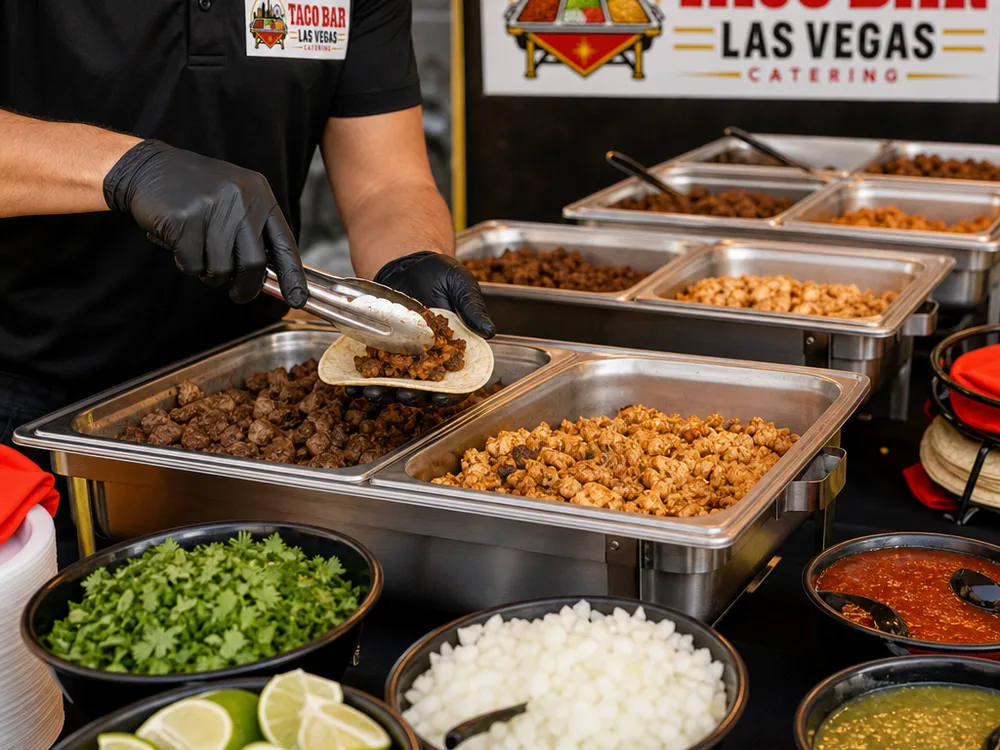 Taco bar ingredients with proteins, tortillas, cilantro, onions, salsas, limes, and serving utensils
